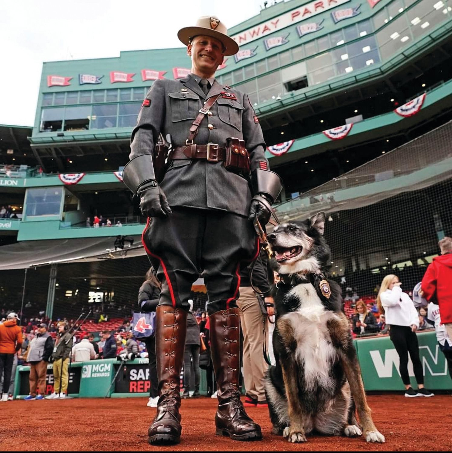 REMARKABLE RESCUE: Ruby and her handler Corporal Daniel O’Neil worked out of the Scituate State Police barracks, and served together since 2011. They recently visited Fenway Park in Boston, Massachusetts.
